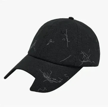 Front of the black baseball cap with the cat-ear brim